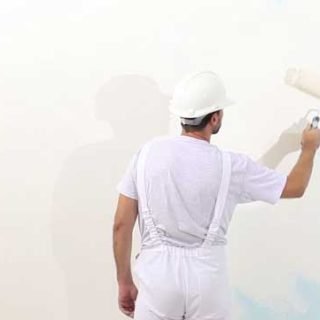painter painting wall